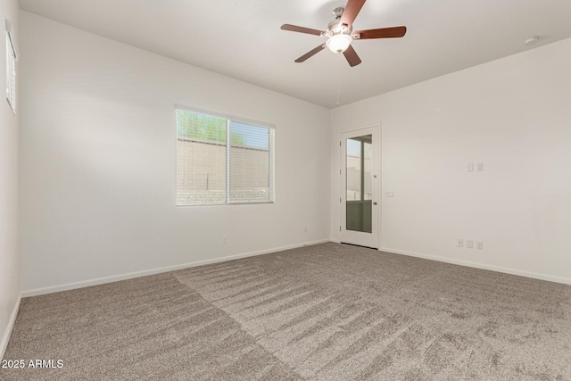 10502 W Bronco Trl, Peoria, AZ 85383 - unfurnished room featuring carpet floors, ceiling fan, and baseboards