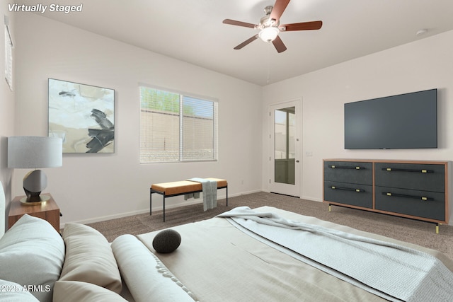10502 W Bronco Trl, Peoria, AZ 85383 - carpeted bedroom featuring baseboards and ceiling fan