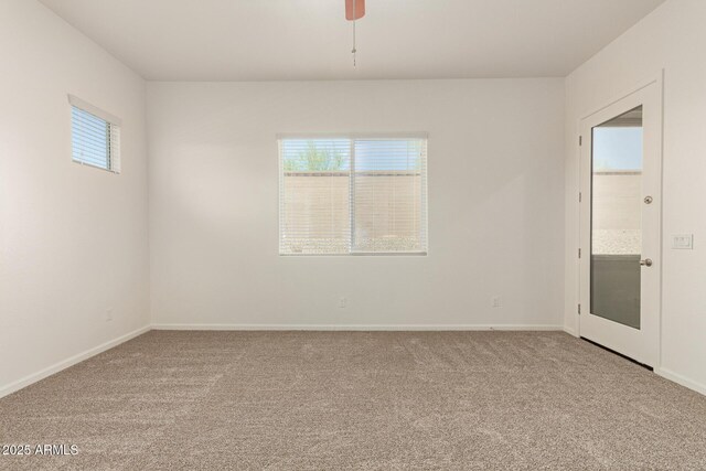10502 W Bronco Trl, Peoria, AZ 85383 - carpeted empty room with baseboards and a ceiling fan