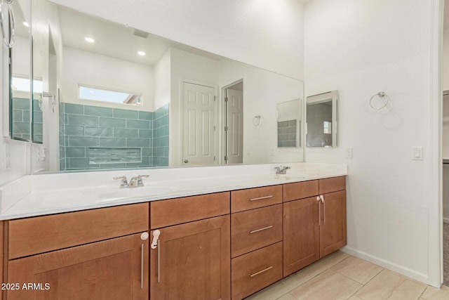 10502 W Bronco Trl, Peoria, AZ 85383 - bathroom with double vanity, baseboards, and tile patterned floors