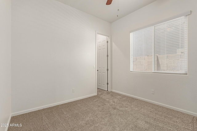 10502 W Bronco Trl, Peoria, AZ 85383 - empty room with carpet flooring, a ceiling fan, and baseboards