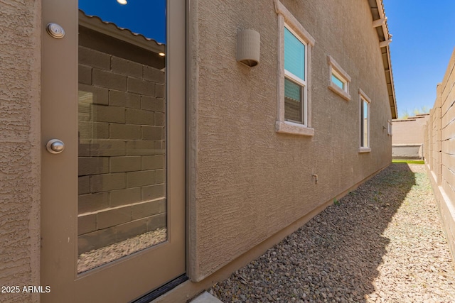 10502 W Bronco Trl, Peoria, AZ 85383 - view of side of home featuring stucco siding