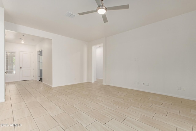 10502 W Bronco Trl, Peoria, AZ 85383 - spare room with ceiling fan and baseboards