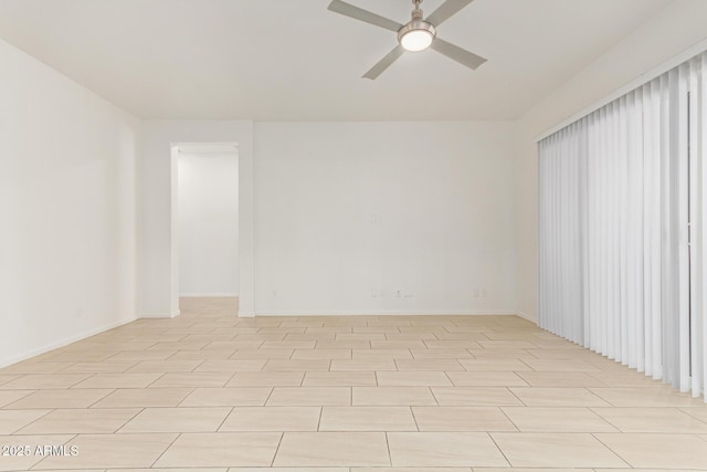 10502 W Bronco Trl, Peoria, AZ 85383 - empty room featuring ceiling fan, baseboards, and light wood finished floors