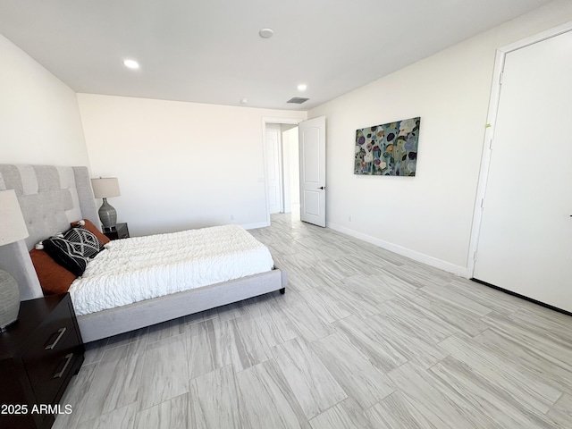 bedroom with recessed lighting, visible vents, and baseboards