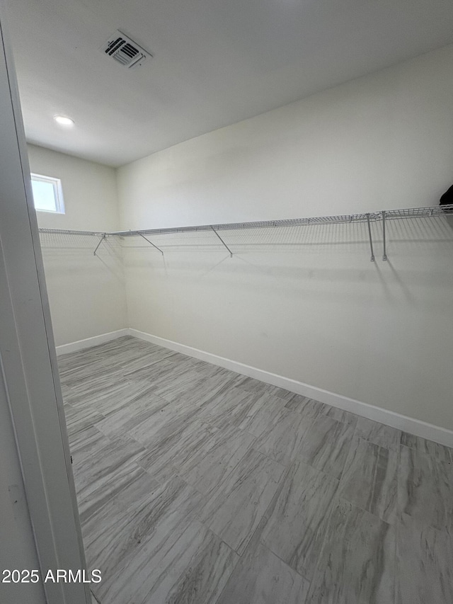 spacious closet with visible vents