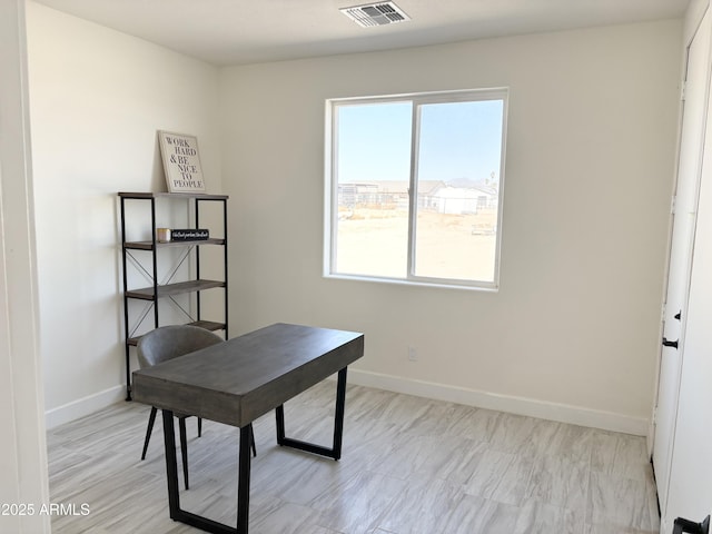 office with visible vents and baseboards