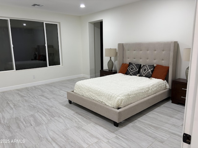 bedroom with recessed lighting, visible vents, and baseboards