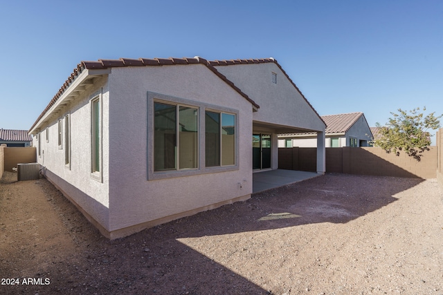 rear view of house with a patio