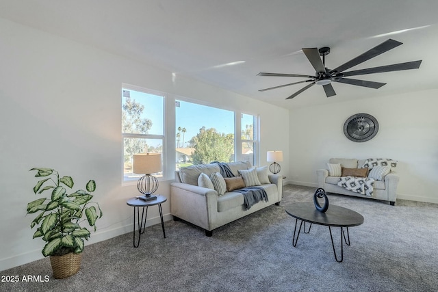 carpeted living room featuring ceiling fan