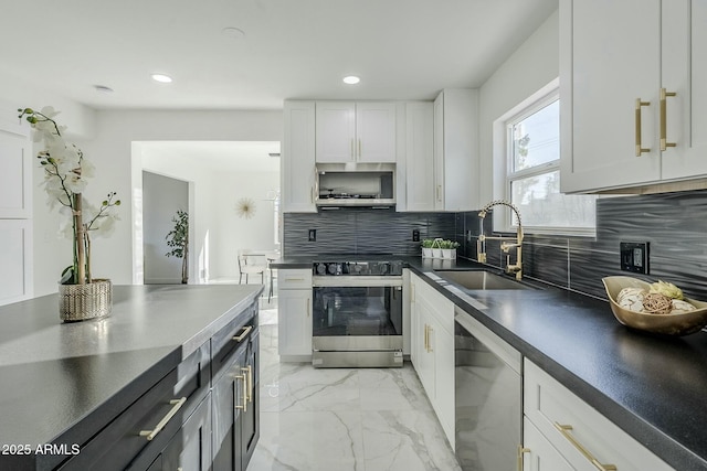 kitchen featuring white cabinetry, sink, and stainless steel appliances