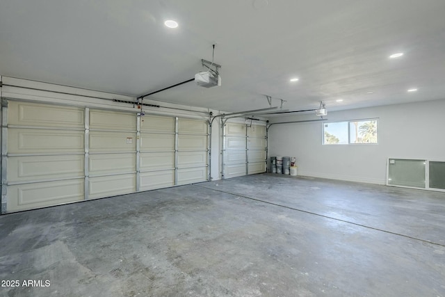 garage featuring a garage door opener