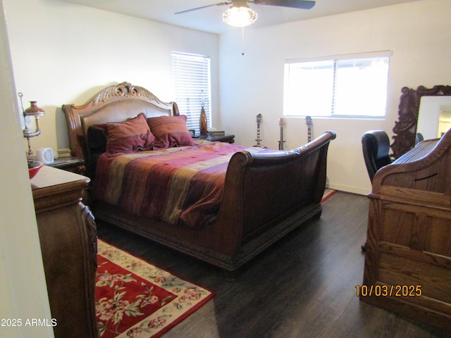 bedroom with ceiling fan and wood finished floors