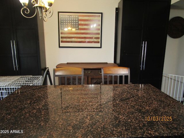 dining space featuring a chandelier