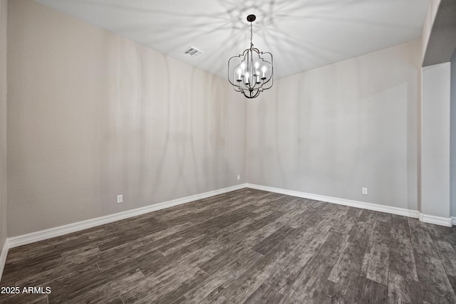 1319 N Chatsworth St, Mesa, AZ 85207 - unfurnished dining area with visible vents, dark wood finished floors, baseboards, and an inviting chandelier