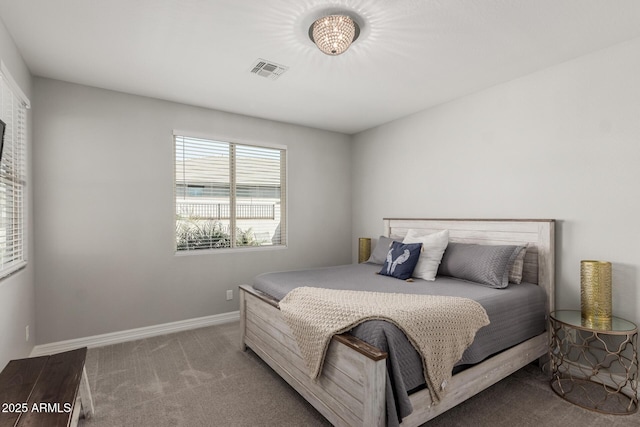 bedroom featuring visible vents, baseboards, and carpet flooring
