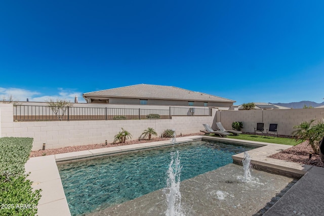view of swimming pool featuring a fenced in pool and a fenced backyard