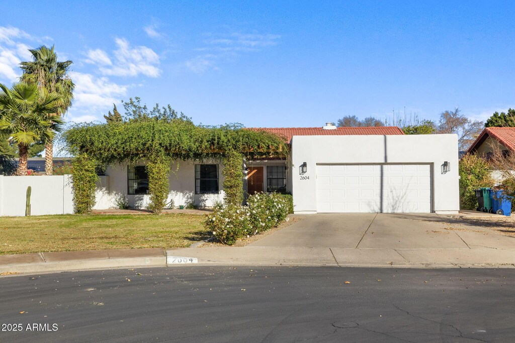 view of front of home with a garage
