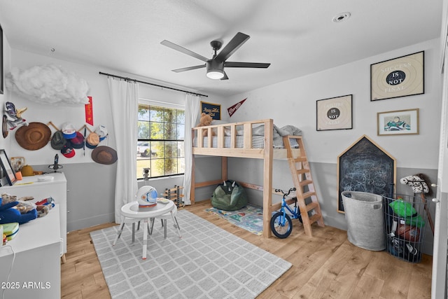 bedroom with light wood-type flooring