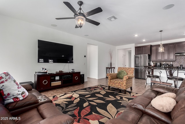 19889 W Montecito Ave, Litchfield Park, AZ 85340 - living area with ceiling fan, recessed lighting, and baseboards