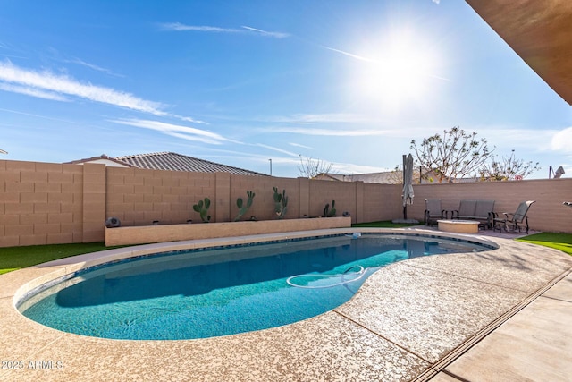 19889 W Montecito Ave, Litchfield Park, AZ 85340 - view of swimming pool with a patio and a fenced backyard