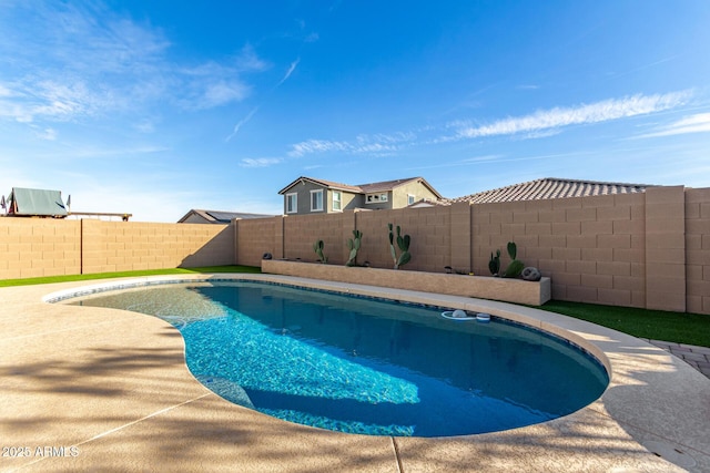 19889 W Montecito Ave, Litchfield Park, AZ 85340 - view of swimming pool with a fenced backyard and a patio area