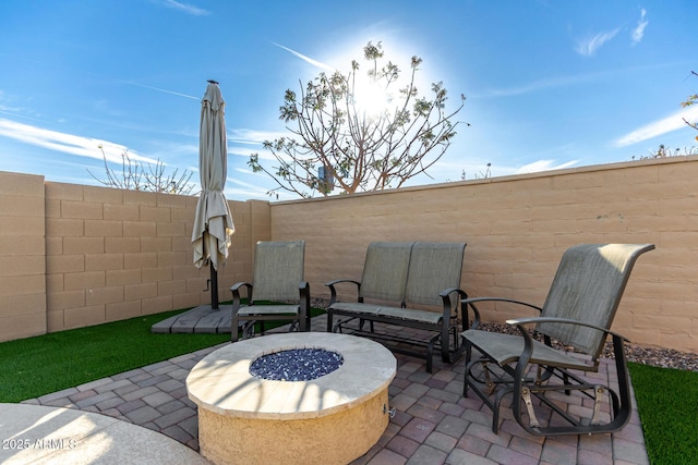 19889 W Montecito Ave, Litchfield Park, AZ 85340 - fenced backyard with a patio area and a fire pit