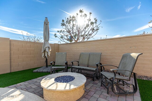 19889 W Montecito Ave, Litchfield Park, AZ 85340 - fenced backyard with a patio area and a fire pit