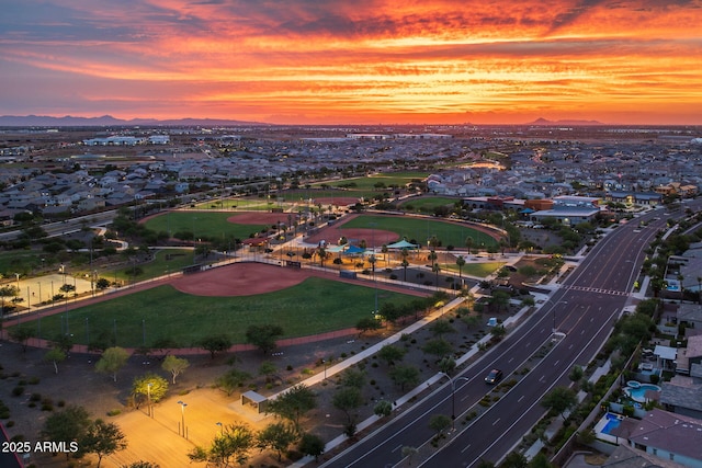 aerial view at dusk of a mountain view and a residential view