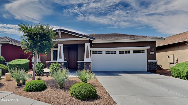 craftsman-style house featuring a garage