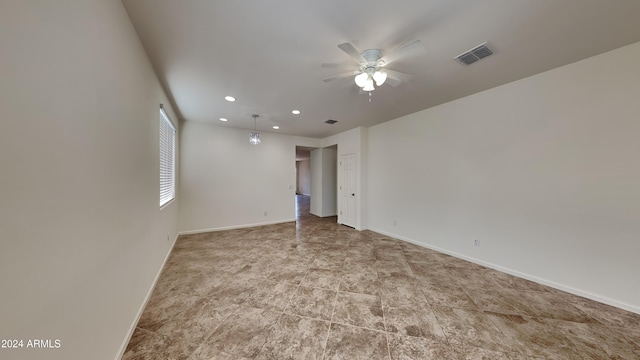 spare room featuring ceiling fan