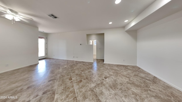 spare room with ceiling fan