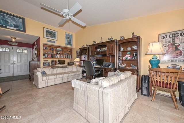 living room with light tile patterned floors and ceiling fan