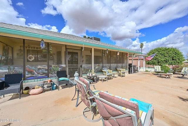 view of patio / terrace featuring a fire pit