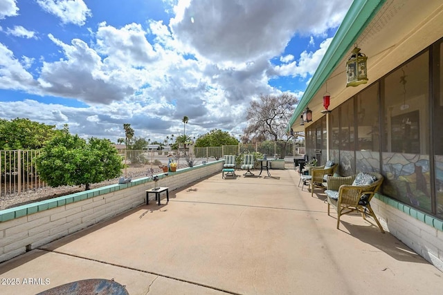 view of patio with fence