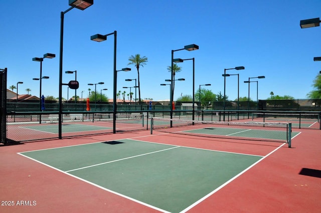 view of sport court with community basketball court and fence