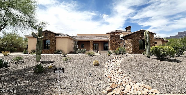 6551 E Flat Iron Loop, Gold Canyon, AZ 85118 - mediterranean / spanish-style home with a tile roof and stucco siding
