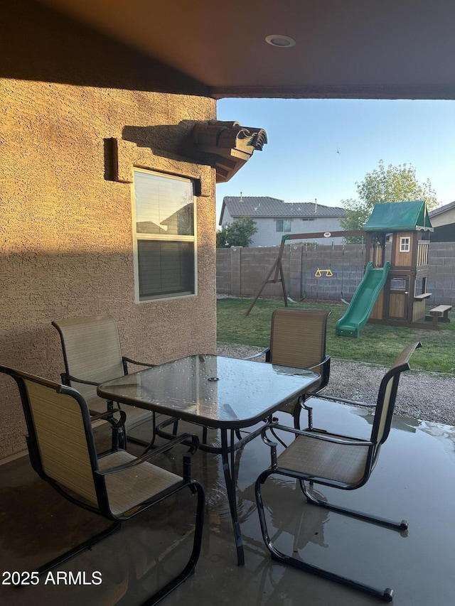 6920 S 46th Dr, Laveen, AZ 85339 - view of patio featuring a playground and outdoor dining area