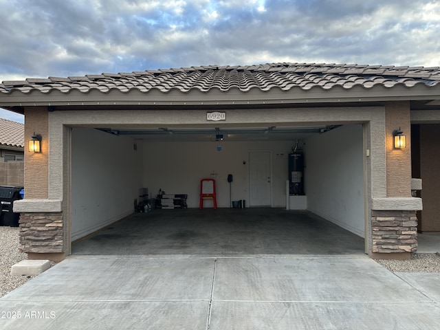 6920 S 46th Dr, Laveen, AZ 85339 - garage with driveway and water heater