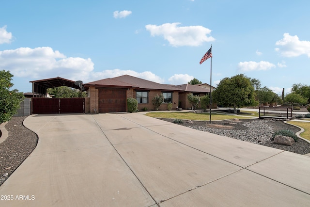 21131 E Excelsior Ave, Queen Creek, AZ 85142 - ranch-style home with an attached garage, driveway, brick siding, and a carport