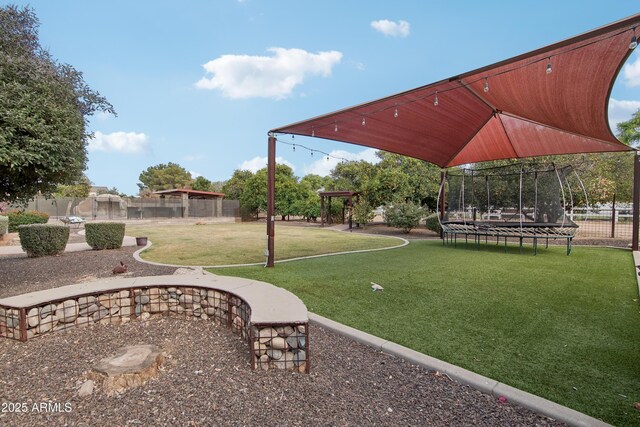 21131 E Excelsior Ave, Queen Creek, AZ 85142 - view of home's community featuring a trampoline