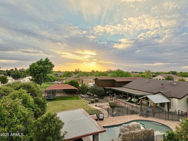 21131 E Excelsior Ave, Queen Creek, AZ 85142 - pool at dusk with a patio area