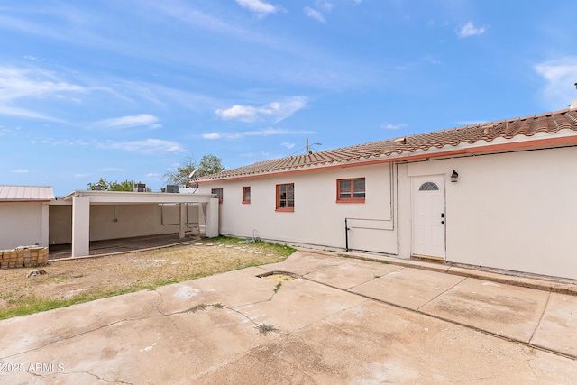 841 W Spray St, Superior, AZ 85173 - rear view of property with a patio area, stucco siding, and a tile roof