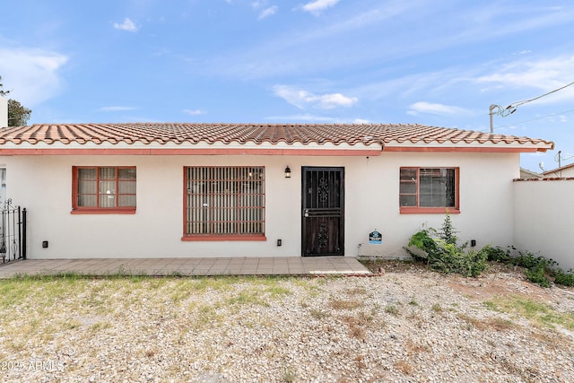 841 W Spray St, Superior, AZ 85173 - view of front of house featuring a tiled roof and stucco siding