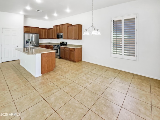 18207 W Marshall Ln, Surprise, AZ 85388 - kitchen featuring brown cabinets, light countertops, stainless steel appliances, light tile patterned floors, and visible vents