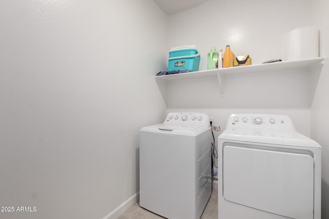 laundry room with separate washer and dryer