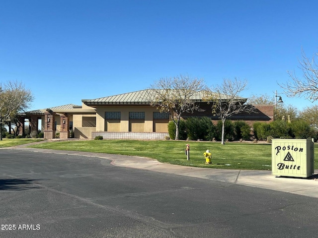 view of front of home with a front yard