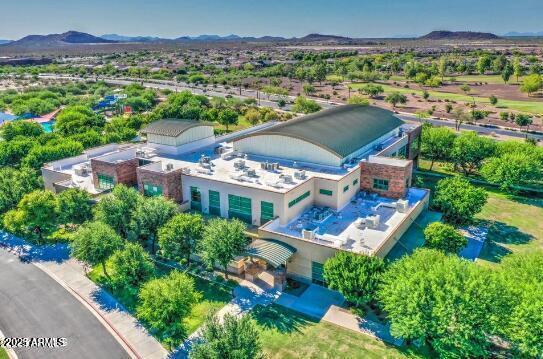 birds eye view of property with a mountain view