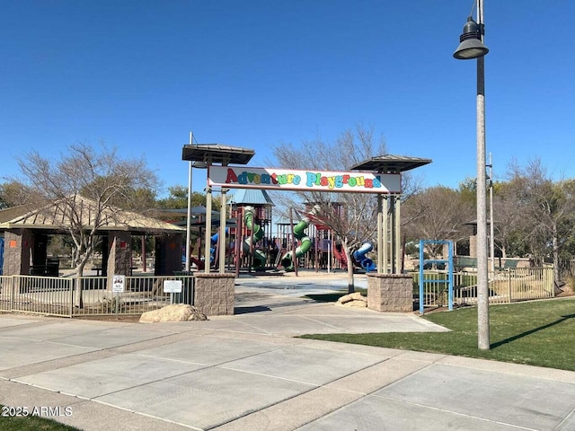 surrounding community featuring a gazebo and a playground