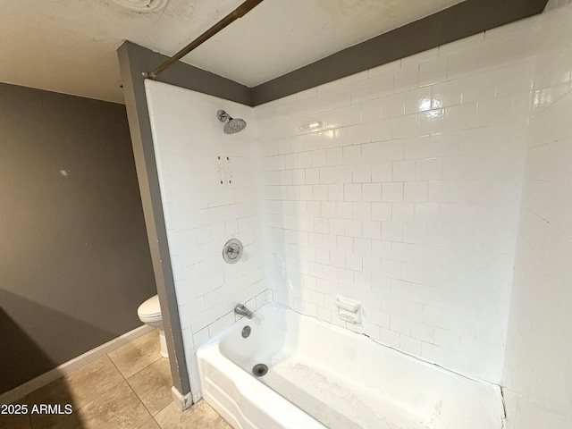 1702 W Tuckey Ln Unit 209, Phoenix, AZ 85015 - bathroom with toilet, tile patterned flooring, shower / bath combination, and baseboards
